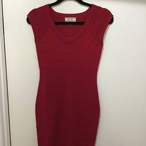 Red body con dress